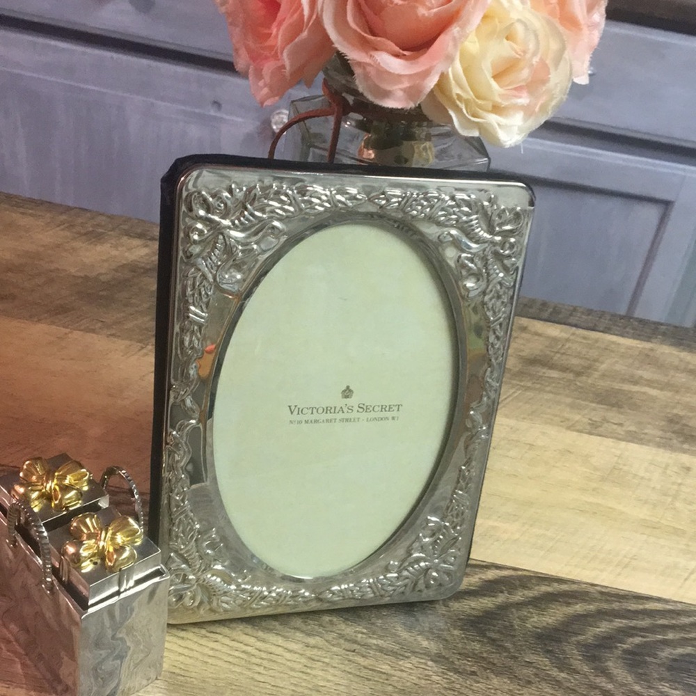 Vintage Victoria’s Secret silver plated photo album.